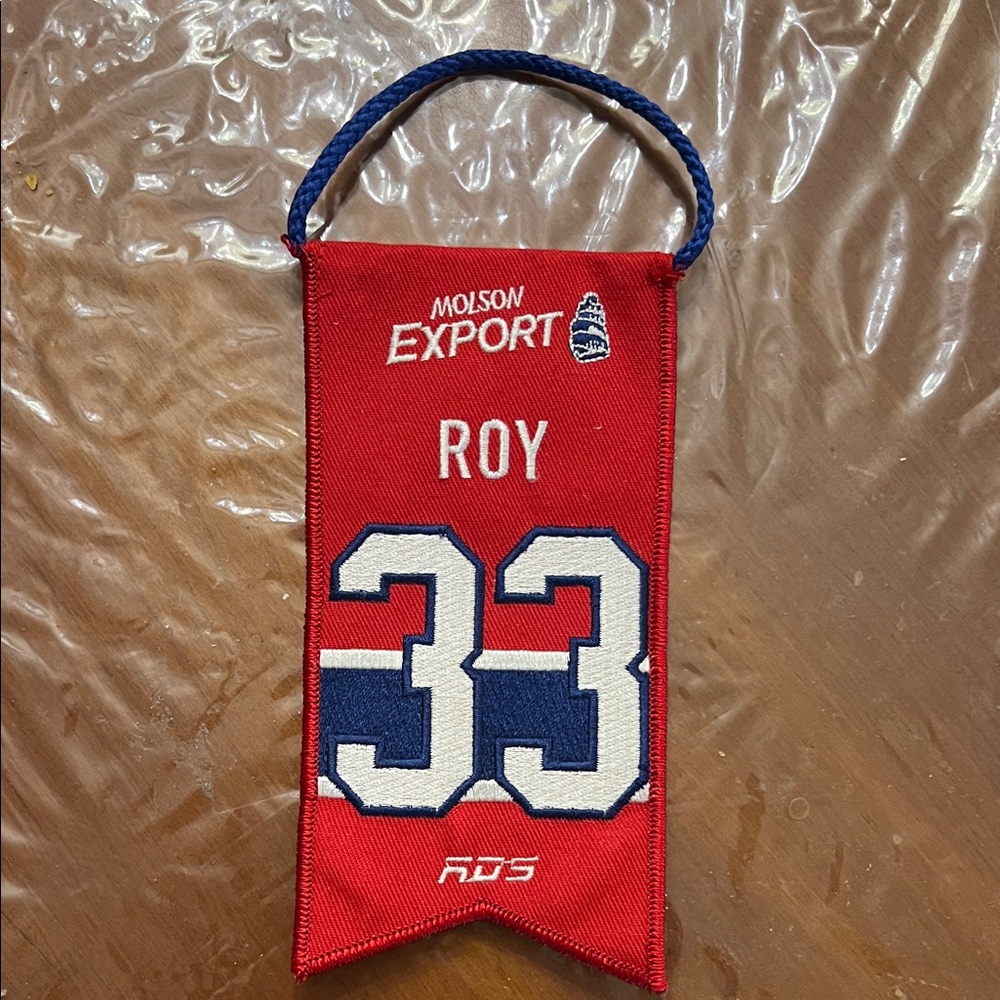 Montreal Canadians Roy Molson Export Red Banner with Blue and White Accents
